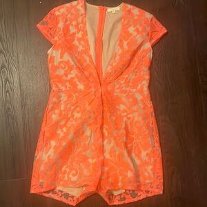 Large, pink lace romper